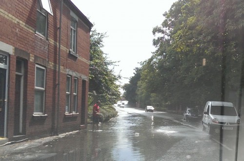 man-cleans-drains