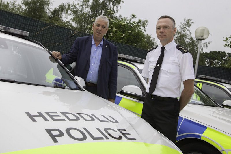 PCC Arfon Jones at Roads Policing Unit in St Asaph. Pictured is Police and Crime Commissioner Arfon Jones with Chief Inspector Darren Wareing .